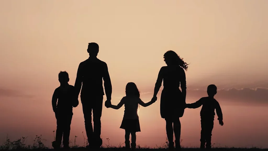 Family Holding hands in sunset - Where to Watch The Final War The 100-Year Plot to Defeat America